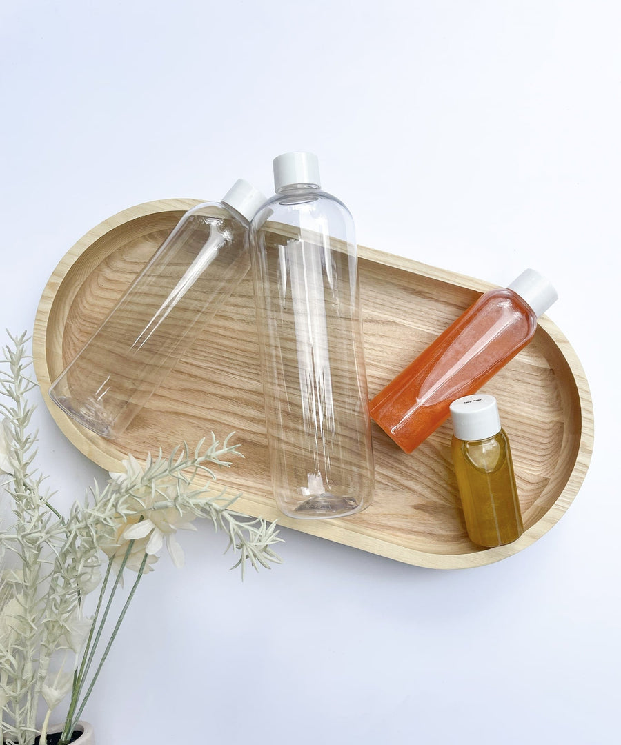 Bulk nail serum bottles in a range of fragrances, used by Australian nail salons as cuticle oil